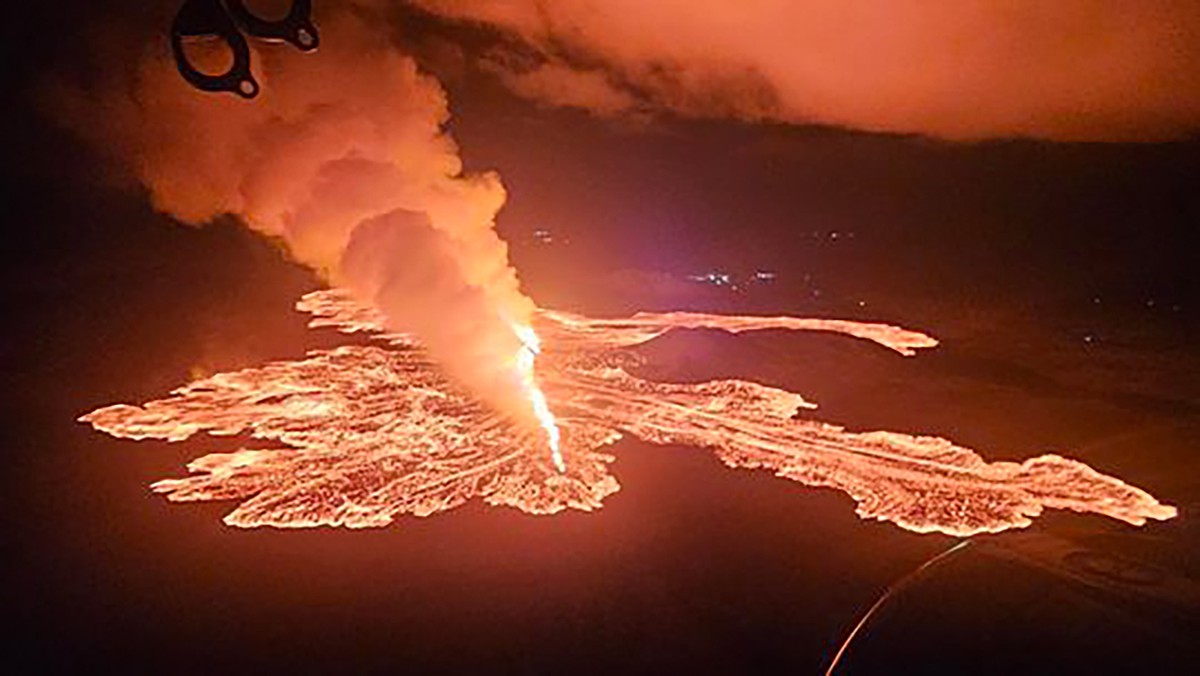 epa11732410 ?A handout photo made available by the Icelandic Civil Protection Department shows a volcanic eruption near Grindavik, Reykjanes peninsula, Iceland, 21 November 2024, as seen from a coast  ...