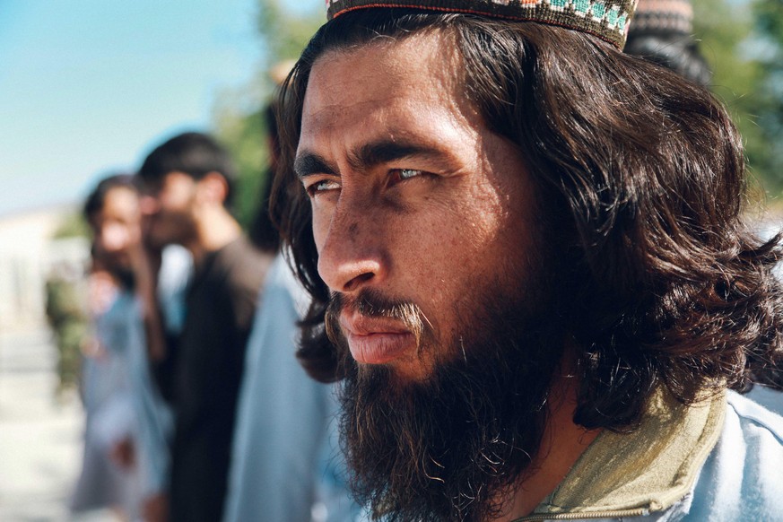 epa08445523 A Taliban prisoner looks on during his release from Bagram prison in Parwan province, Afghanistan, 26 May 2020. The Afghan government released hundreds of Taliban prisoners after the Afgha ...