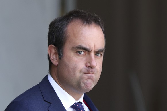 French Defense Minister Sebastien Lecornu leaves the weekly cabinet meeting, Tuesday, July 16, 2024 in Paris. (AP Photo/Aurelien Morissard)