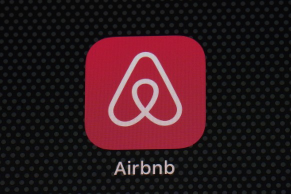 FILE - The Airbnb app icon is displayed on an iPad screen in Washington, D.C., on May 8, 2021. Airbnb Inc. reports quarterly financial results on Tuesday, Feb. 14, 2023. (AP Photo/Patrick Semansky, Fi ...