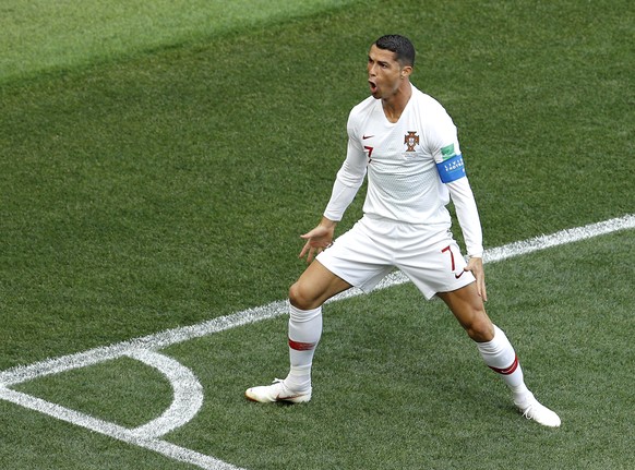 Portugal&#039;s Cristiano Ronaldo celebrates after scoring the opening goal during the group B match between Portugal and Morocco at the 2018 soccer World Cup in the Luzhniki Stadium in Moscow, Russia ...