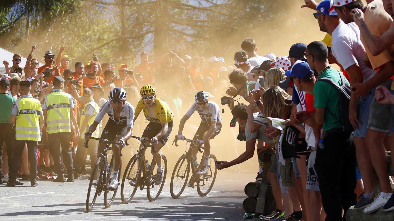 Colombia&#039;s Egan Arley Bernal Gomez, Britain&#039;s Geraint Thomas, wearing the overall leader&#039;s yellow jersey, and Britain&#039;s Chris Froome climb alpe d&#039;huez during the twelfth stage ...