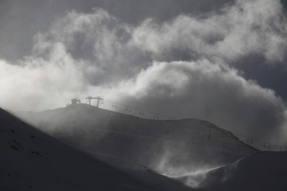 A view of the slope as an alpine ski, women's World Cup downhill was cancelled due to strong wind, in Cervinia-Zermatt, Italy, Saturday, Nov. 18, 2023. (AP Photo/Gabriele Facciotti)
