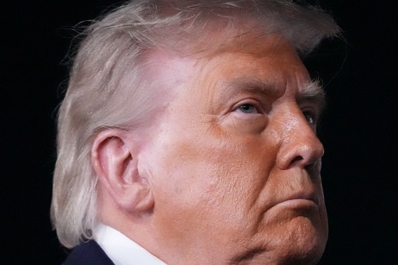 President Donald Trump talks with reporters before boarding Air Force One at John F. Kennedy International Airport in New York, early Tuesday, June 9, 2026. (AP Photo/Mark Schiefelbein)
Donald Trump