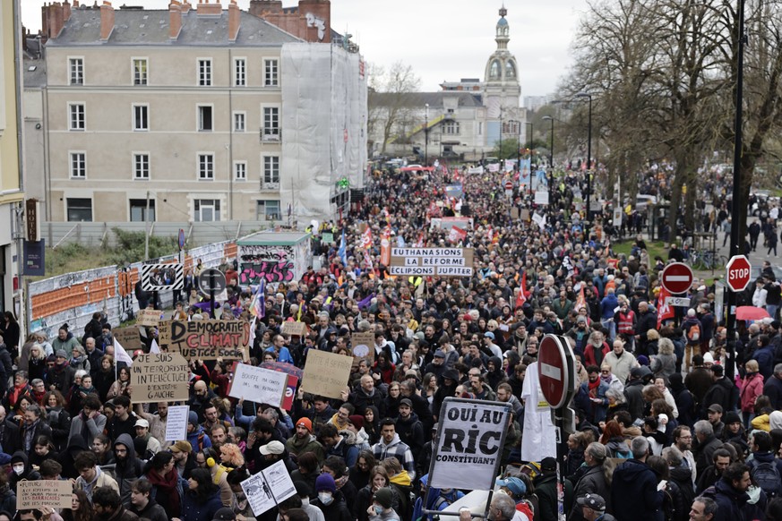 Protesters march in Nantes, western France, on Thursday, April 6, 2023.  Hundreds of thousands of people are expected to fill the streets of France on Thursday for the 11th day of nationwide resistance to…