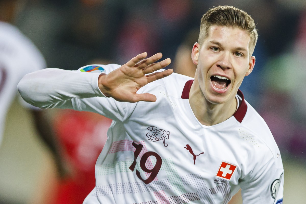 Switzerland's midfielder Cedric Itten celebrates his goal during the UEFA Euro 2020 qualifying Group D soccer match between Switzerland and Georgia at the Kybunpark stadium in St. Gallen, Switzer ...
