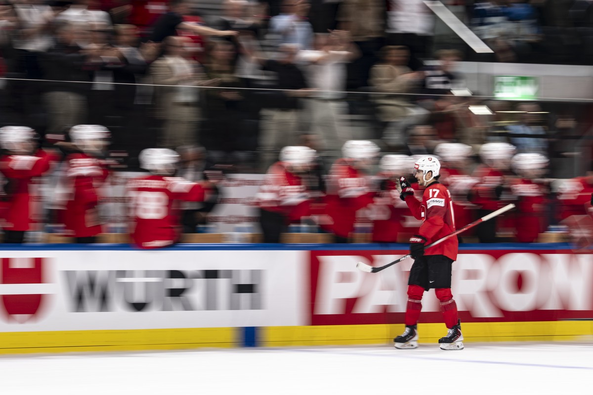 Switzerland's Ken Jager celebrates after scoring the third goal during the 2026 IIHF Men's Ice Hockey World Championship preliminary round group A game between Switzerland and Finland, at th ...