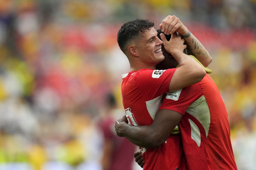 epa13096743 Granit Xhaka (L) and Breel Embolo of Switzerland celebrate after winning the FIFA World Cup 2026 Round of 16 match Switzerland against Colombia, in Vancouver, Canada, 07 July 2026. EPA/BOB ...