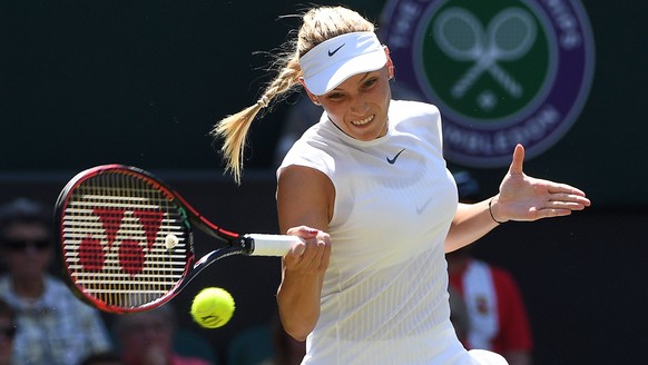 epa06067419 Donna Vekic of Croatia returns to Johanna Konta of Britain in their second round match during the Wimbledon Championships at the All England Lawn Tennis Club, in London, Britain, 05 July 2 ...