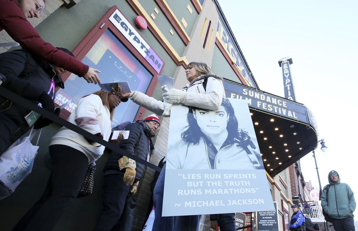 Catherine Van Tighem who drove from Calgary, Canada hands out pamphlets in support of Michael Jackson outside of the premiere of the "Leaving Neverland" Michael Jackson documentary film at t ...