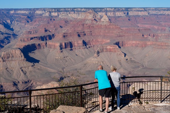 Tourists take in the view near Mather Point at Grand Canyon National Park on the first day of the government shutdown Wednesday, Oct. 1, 2025, in Grand Canyon, Ariz. (AP Photo/Ross D. Franklin)
Govern ...