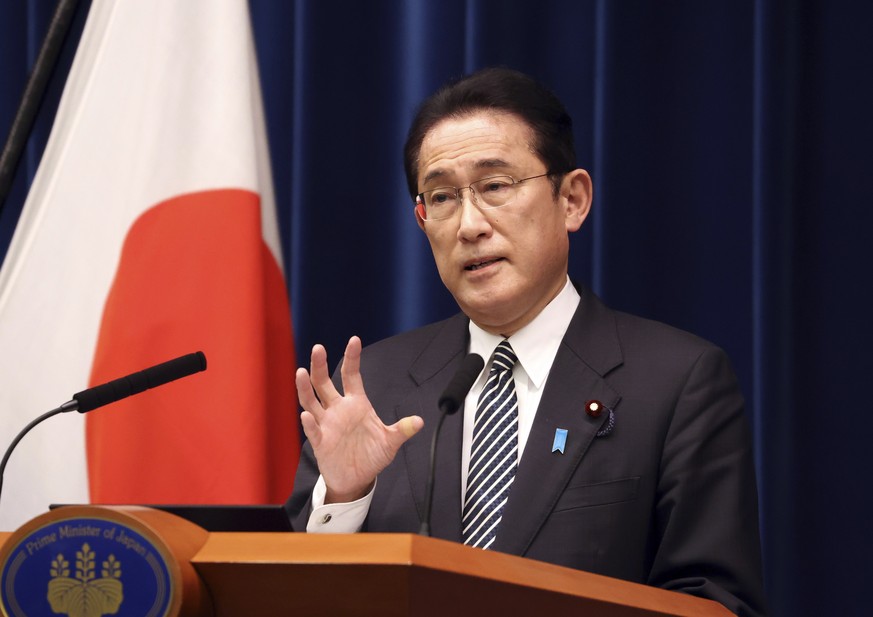 Japanese Prime Minister Fumio Kishida speaks during a press conference at the prime minister&#039;s official residence in Tokyo Tuesday, Dec. 21, 2021, as an extraordinary Diet session was closed on T ...