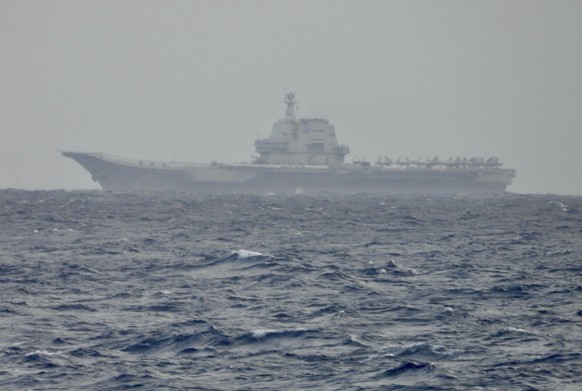This image released by the Taiwan Ministry of National Defense shows China?s Shandong aircraft carrier sailing near Taiwan on Monday, March 31, 2025. (Taiwan Ministry of National Defense via AP)
China ...