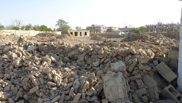 epa09170840 Aftermath of a truck bomb blast in Pul-e-Alam, the provincial capital of Logar province, Afghanistan, 01 May 2021. A truck bomb exploded in Pul-e-Alam on 30 April, killing at least 25 peop ...