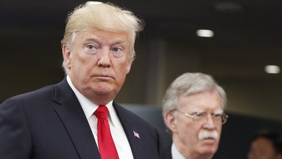 epa08498486 (FILE) - US President Donald Trump (L) arrives with US National Security Advisor John Bolton (R) during the 73rd session of the General Assembly of the United Nations at United Nations Hea ...