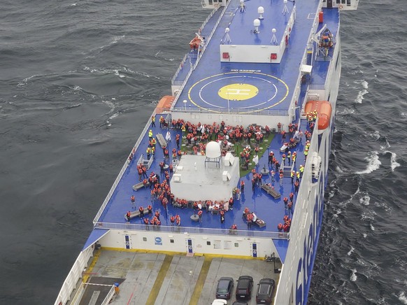 In this image released by the Swedish Maritime Administration, an aerial view of passengers on an outside deck of the ship Stena Scandica off the Swedish island of Gotska Sandön, Monday Aug. 29, 2022. ...