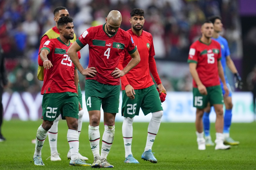 Morocco&#039;s Sofyan Amrabat looks down after his side&#039;s 0-2 lost in aWorld Cup semifinal soccer match at the Al Bayt Stadium in Al Khor, Qatar, Wednesday, Dec. 14, 2022. (AP Photo/Natacha Pisar ...