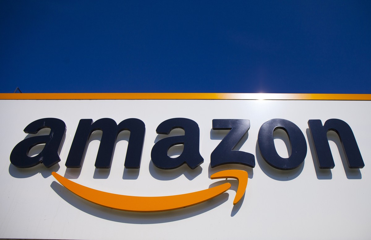 FILE - In this April 16, 2020, file photo, the Amazon logo is displayed in Douai, northern France. Some 130 countries have backed a global minimum tax as part of a worldwide effort to keep multination ...
