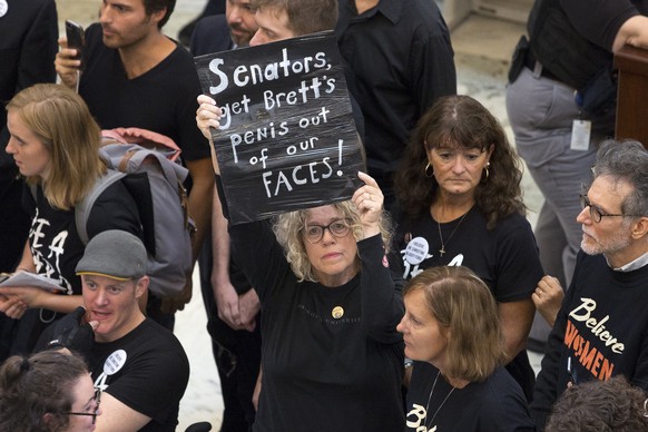 epa07043888 Protesters demonstrate in opposition to US President Donald J. Trump&#039;s nominee to be a US Supreme Court Associate Justice Brett Kavanaugh, in the Russell Senate Office Building atrium ...