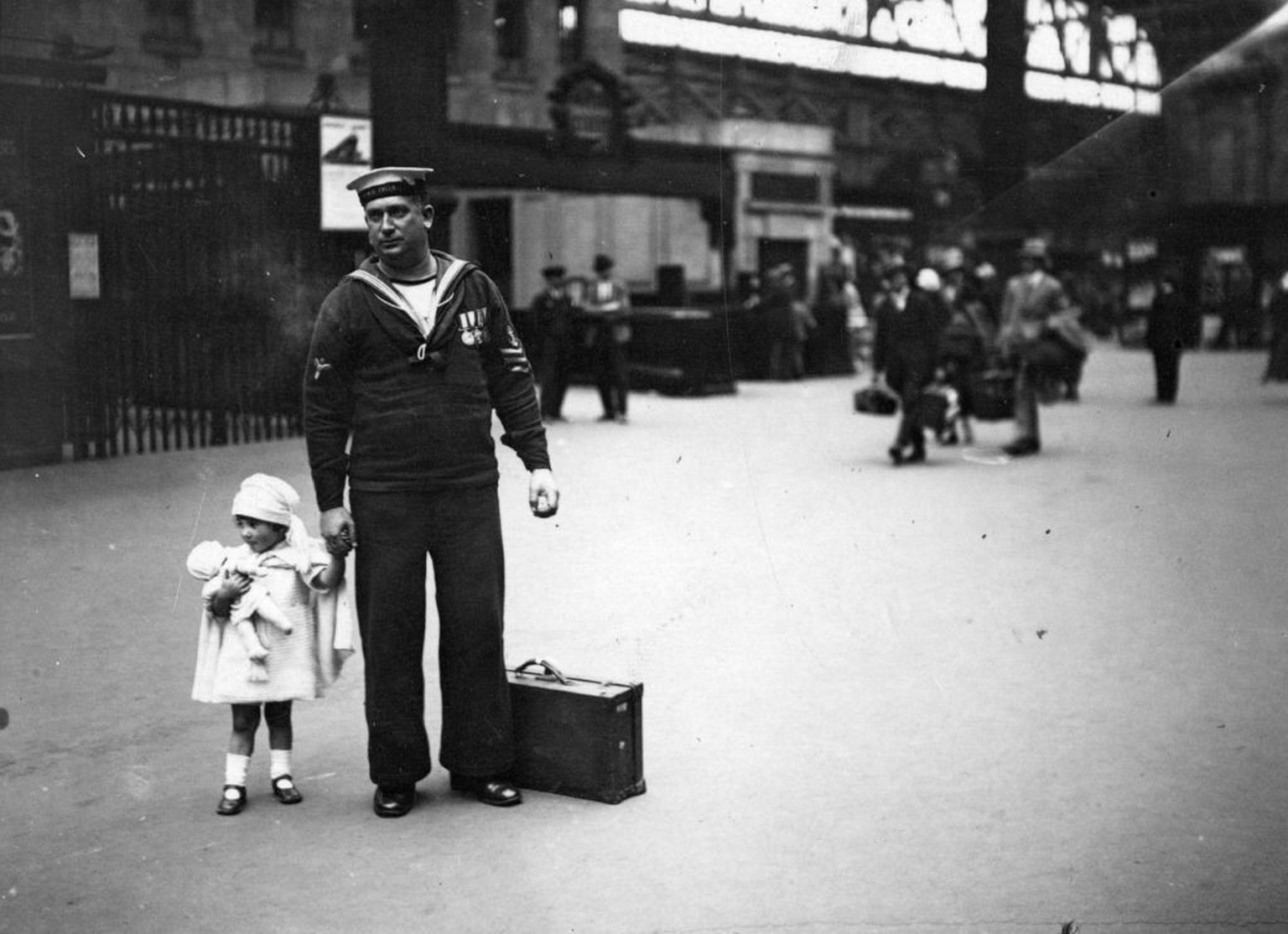 1st July 1924: Off on holiday to the seaside with her dad. (Photo by Topical Press Agency/Hulton Archive/Getty Images)