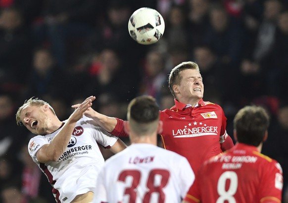 Berlin&#039;s Felix Kroos, right, and Nuremberg&#039;s Hanno Behrens in action during the 2nd Bundesliga soccer match between 1. FC Union Berlin and 1. FC&#039;Nuremberg at the Stadion An der Alten Fo ...