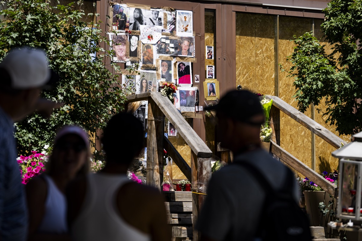 Portraits of the young victims are displayed at the entrance of the bar "Le Constellation" six moths later the deadly fire, in Crans-Montana, Switzerland, Thursday, July 9, 2026. Forty-one p ...