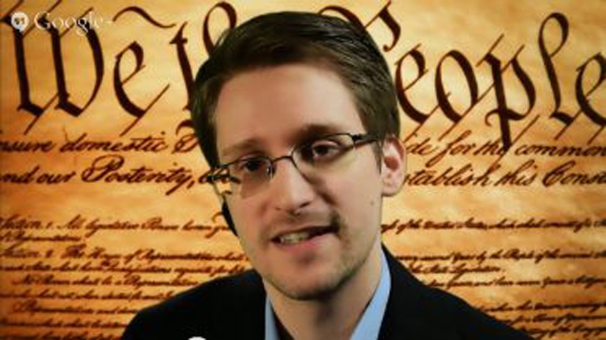 A screengrab shows Edward Snowden speaking via video conference during a panel discussion on internet privacy with representatives from the American Civil Liberties Union (ACLU) at the South by Southw ...