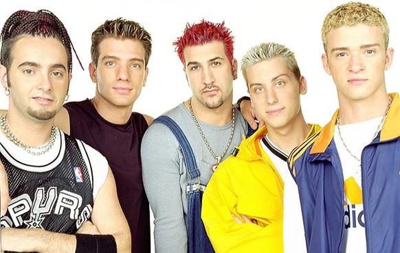 LOS ANGELES, CA - AUGUST 1999: *NSYNC, (clockwise L) Chris Kirkpatrick, JC Chasez, Joey Fatone, Lance Bass and Justin Timberlake sit for a portrait in Los Angeles 1999. *** Local Caption *** Chris Kir ...