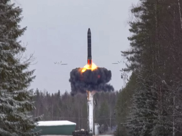 epa09771985 A handout still image taken from handout video made available by the Russian Defence ministry press-service shows launch of the intercontinental ballistic missile &#039;Yar&#039; from Ples ...