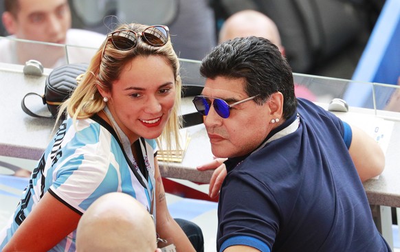 epa06851635 Argentinian soccer legend Diego Maradona (R) poses with a fan prior to the FIFA World Cup 2018 round of 16 soccer match between France and Argentina in Kazan, Russia, 30 June 2018.

(RES ...