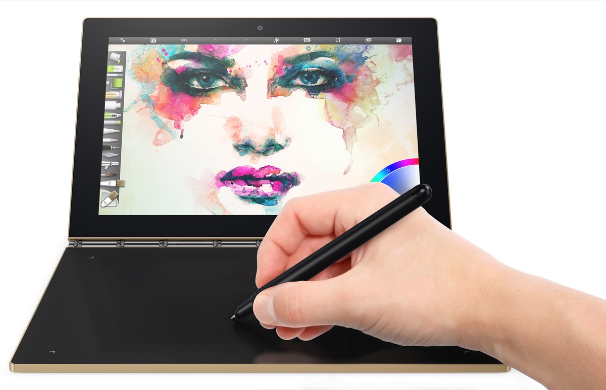 This image provided by Lenovo shows the company's Yoga Book, which doesn't have a physical keyboard. The Yoga Book retains the clamshell design of a laptop, but puts a second touch screen wh ...