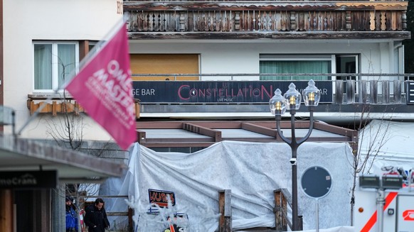 The sealed off Le Constellation bar, where a devastating fire left dead and injured during the New Year's celebrations is seen in Crans-Montana, Swiss Alps, Switzerland, Friday morning, Jan. 2, 2 ...
