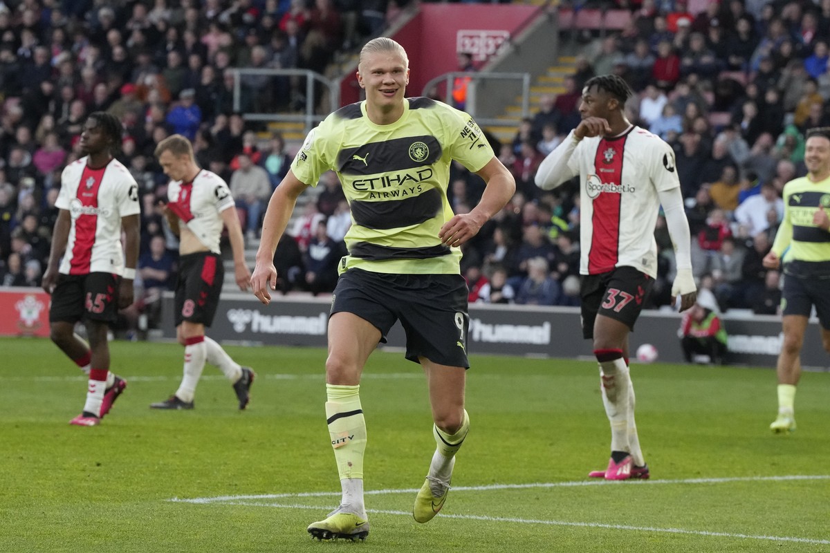 Manchester City's Erling Haaland celebrates after scoring his side's third goal during the English Premier League soccer match between Southampton and Manchester City at St Mary's Stadi ...