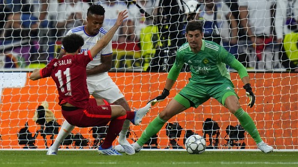 Liverpool&#039;s Mohamed Salah, left, fails to score during the Champions League final soccer match between Liverpool and Real Madrid at the Stade de France in Saint Denis near Paris, Saturday, May 28 ...