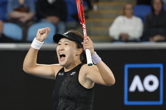 Zhu Lin of China celebrates after defeating Maria Sakkari of Greece in their third round match at the Australian Open tennis championship in Melbourne, Australia, Saturday, Jan. 21, 2023. (AP Photo/As ...