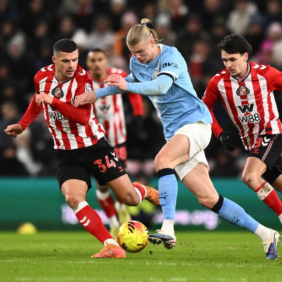 Erling Haaland of Manchester City fends off Granit Xhaka of Sunderland Sunderland v Manchester City, Premier League, Football, Stadium of Light, Sunderland, UK - 01 Jan 2026Sunderland Stadium of Light ...