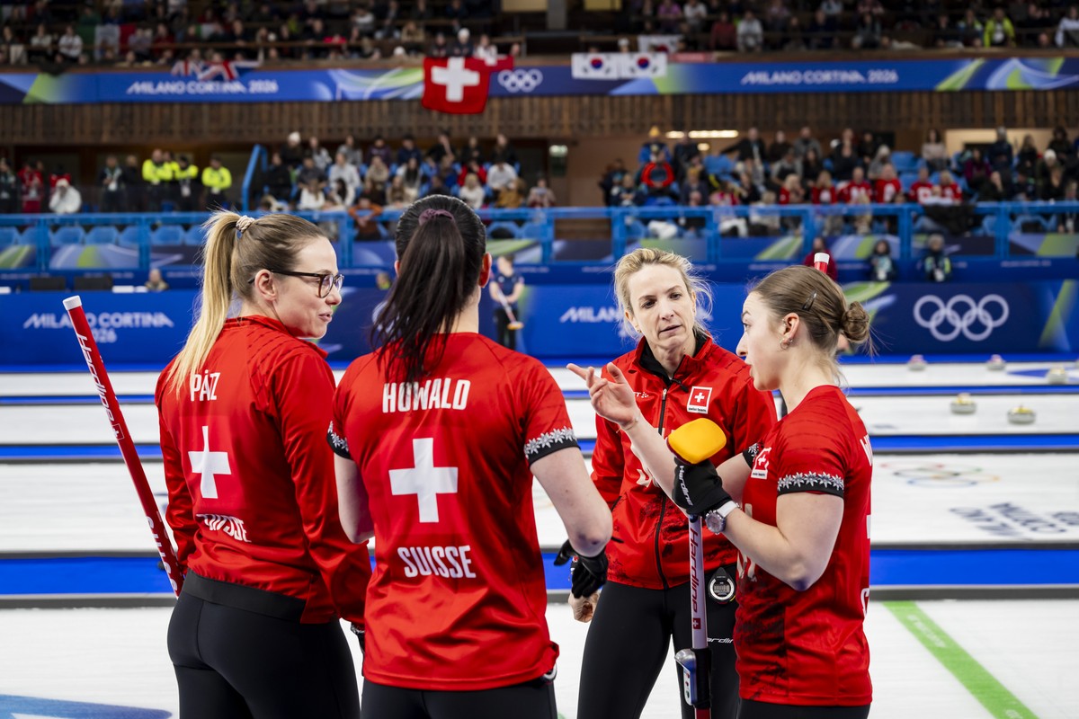 Alina Paetz, Carole Howald, Silvana Tirinzoni and Selina Witschonke of Switzerland, from left to right, react during the curling women's round robin game between Switzerland and USA at the 2026 O ...