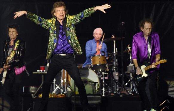 FILE - This Aug. 22, 2019 file photo shows, from left, Ron Wood, Mick Jagger, Charlie Watts and Keith Richards of the Rolling Stones performing in Pasadena, Calif. The band announced Thursday, Feb. 6, ...