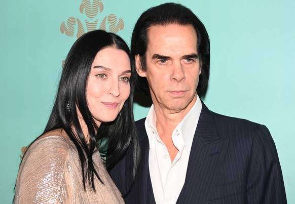 epa09560400 Susie Cave (L) and Nick Cave arrive for the Leopard Awards in Aid of the Prince&#039;s Trust and supported by the Natural Diamond Council at Goldsmith Hall in London, Britain, 02 November  ...