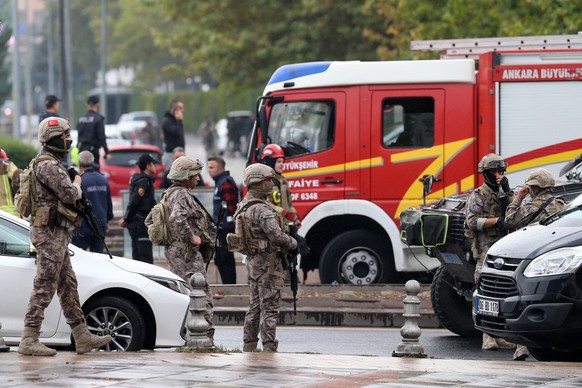 epa10893368 Turkish soldiers secure the site of an attack near the Interior Ministry in Ankara, Turkey, 01 October 2023. According to the Turkish Minister of Interior Ali Yerlikaya, two police officer ...