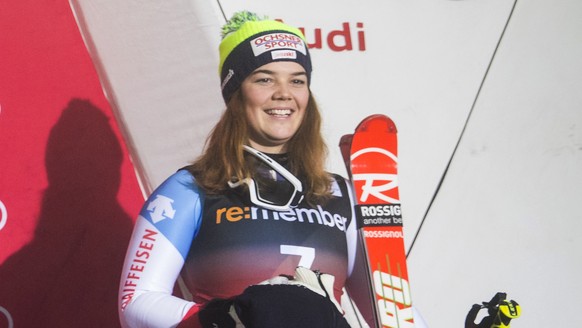 First placed Mikaela Shiffrin of USA, centre, flanked by second placed Wendy Holdener of Switzerland, left, and third placed Melanie Meillard of Switzerland, right, jubilate on the podium after FIS Al ...