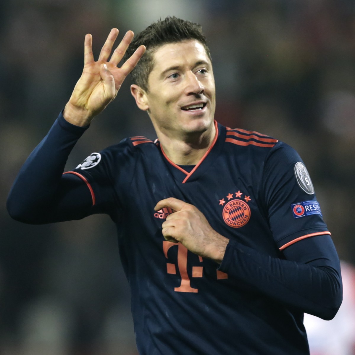 epa08027936 Bayern's Robert Lewandowski celebrates after scoring his fourth goal during the UEFA Champions League group B soccer match between Red Star Belgrade and Bayern Munich in Belgrade, Ser ...