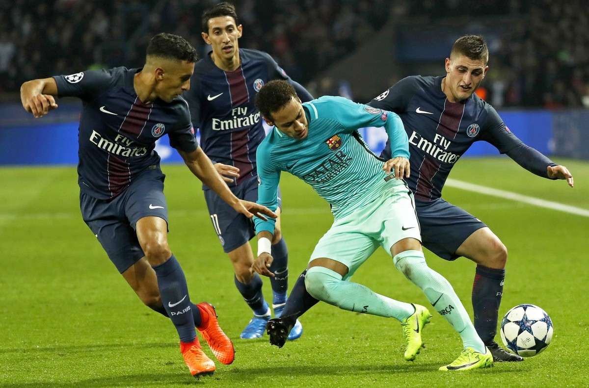 epa06121187 (FILE) - FC Barcelona's Neymar (C) vies for the ball against Paris Saint Germain's Presnel Kimpembe (L), Angel Di Maria (back), and Marco Verratti (R) during the UEFA Champions L ...