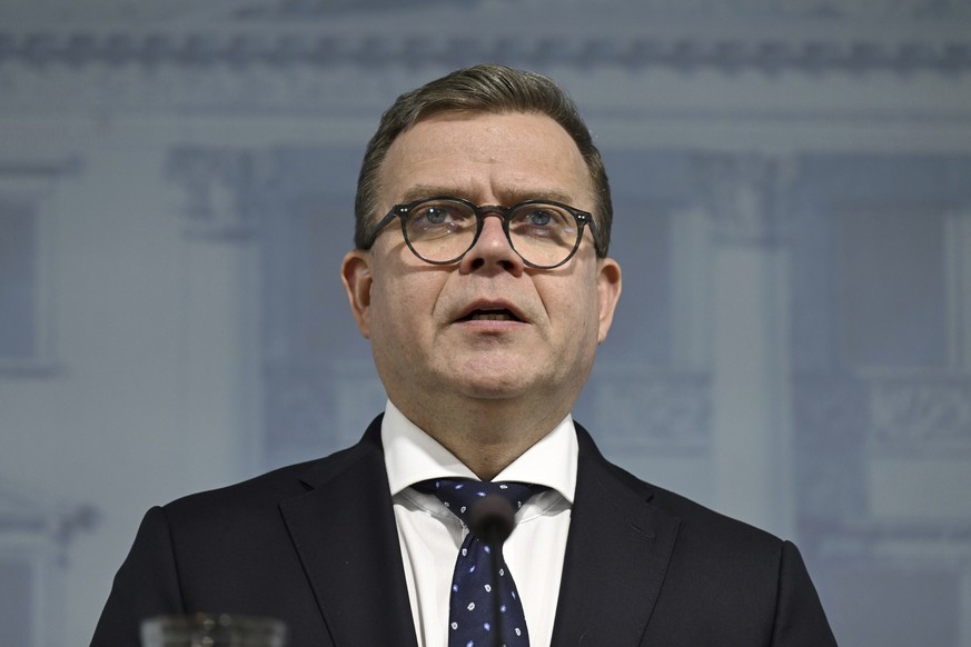 Finland&#039;s Prime Minister Petteri Orpo speaks during a press conference in Helsinki, on Tuesday, Nov. 28, 2023. Finland will close its last remaining road border with Russia due to concerns over m ...