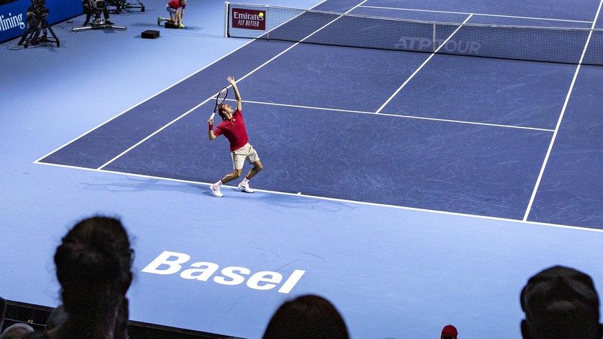 epa07951816 Roger Federer (L) of Switzerland in action during his semifinal match against Stefanos Tsitsipas of Greece at the Swiss Indoors tennis tournament in Basel, Switzerland, 26 October 2019. EP ...