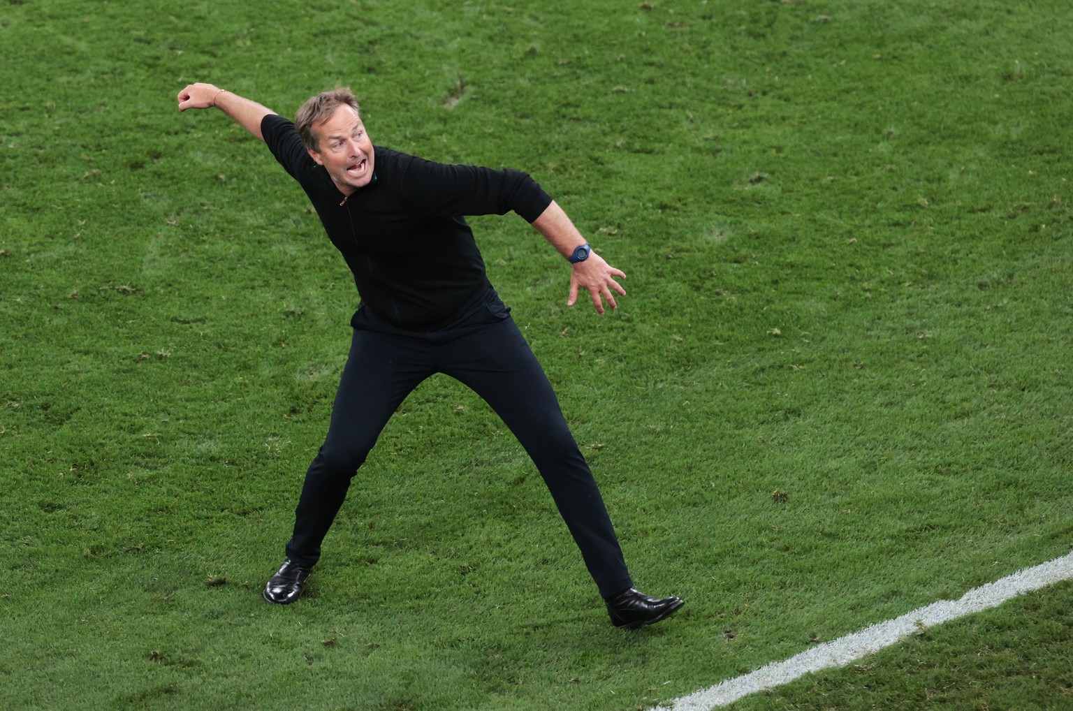 epa09292232 Head coach of Denmark Kasper Hjulmand celebrates after winning the UEFA EURO 2020 group B preliminary round soccer match between Russia and Denmark in Copenhagen, Denmark, 21 June 2021. EP ...