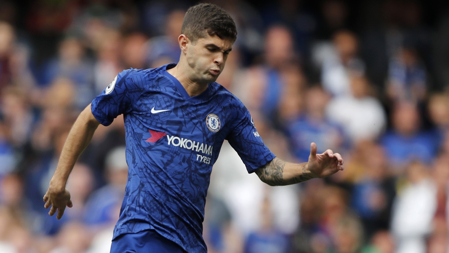 FILE - In this Sunday, Aug. 18, 2019 file photo, Chelsea&#039;s Christian Pulisic, center, vies for the ball with Leicester&#039;s Ricardo Pereira, left, in front of Leicester&#039;s goalkeeper Kasper ...