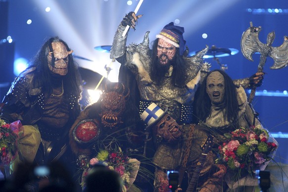 FILE - Finnish group Lordi celebrate after their victory in the Eurovision Song Contest at the Indoor Olympic stadium in Athens, Greece, May 21, 2006. The 68th Eurovision Song Contest is taking place  ...