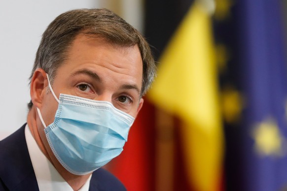 epa09547269 Belgian Prime Minister Alexander De Croo speaks during a press conference after a meeting with federal and regionals governments called CODECO regarding COVID-19 measures, in Brussels, Bel ...