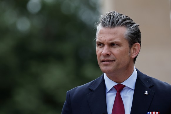 U.S. Defense Secretary Pete Hegseth delivers a speech at the US cemetery to commemorate the 82nd anniversary of the D-Day landings, in Colleville-sur-Mer, Normandy, France, Saturday, June 6, 2026. (AP ...